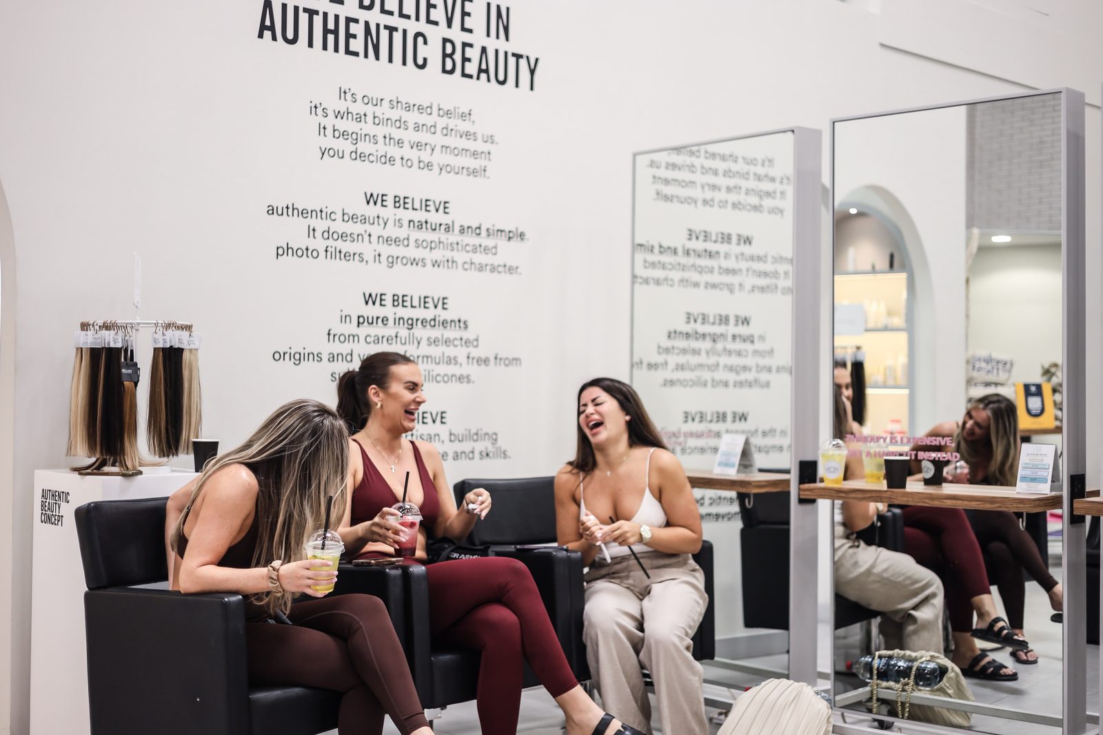 Women in the salon by the authentic beauty wall